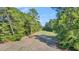 Aerial view of a wooded lot with road access at 1144 Old Mill Rd, Saint Stephen, SC 29479