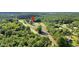 Aerial view showing home's location in a wooded area at 1144 Old Mill Rd, Saint Stephen, SC 29479