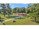 Ranch home with large yard and detached shed, aerial view at 1144 Old Mill Rd, Saint Stephen, SC 29479