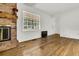 Hardwood floors and a view to the back yard from the living room at 1144 Old Mill Rd, Saint Stephen, SC 29479