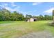 Spacious backyard with a shed and a two-car garage at 1144 Old Mill Rd, Saint Stephen, SC 29479