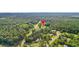 Aerial view showing home's location and surrounding trees at 1144 Old Mill Rd, Saint Stephen, SC 29479