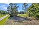 Vacant lot with cleared area and treeline at 1144 Old Mill Rd, Saint Stephen, SC 29479
