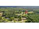 Aerial view of property showing home's location near a road at 1144 Old Mill Rd, Saint Stephen, SC 29479