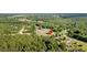 Aerial view showcasing home location in a wooded area at 1144 Old Mill Rd, Saint Stephen, SC 29479