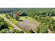 Aerial view of a house and lot in a wooded area at 1144 Old Mill Rd, Saint Stephen, SC 29479