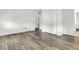 Empty bedroom featuring grey vinyl flooring and a closet at 1144 Old Mill Rd, Saint Stephen, SC 29479