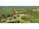 Aerial view showing home's location near a road and trees at 1144 Old Mill Rd, Saint Stephen, SC 29479