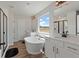Elegant bathroom with soaking tub, double vanity, and walk-in shower at 4413 Palm Shadow Dr, Summerville, SC 29485