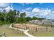 Fenced dog park with walking path and landscaping at 4413 Palm Shadow Dr, Summerville, SC 29485