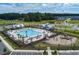 Aerial view showing community pool, playground, and clubhouse at 4413 Palm Shadow Dr, Summerville, SC 29485