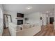 Spacious living room with a fireplace and built-in shelving at 4413 Palm Shadow Dr, Summerville, SC 29485