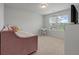 Charming bedroom with daybed, desk and window seat at 4413 Palm Shadow Dr, Summerville, SC 29485