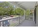 Spacious balcony overlooking a tree-lined parking lot at 2317 Tall Sail Dr # 1007 G, Charleston, SC 29414