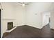 Spacious living room with dark hardwood floors and a fireplace at 2317 Tall Sail Dr # 1007 G, Charleston, SC 29414