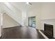 Living room features a fireplace, hardwood floors, and a staircase at 2317 Tall Sail Dr # 1007 G, Charleston, SC 29414