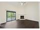 Living room with fireplace and sliding glass doors to patio at 2317 Tall Sail Dr # 1007 G, Charleston, SC 29414