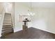 Bright dining room with dark hardwood floors and kitchen access at 2317 Tall Sail Dr # 1007 G, Charleston, SC 29414