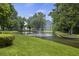 Serene pond with a fountain and lush landscaping at 2317 Tall Sail Dr # 1007 G, Charleston, SC 29414