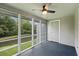 Screened porch overlooking a pond with ceiling fan at 2317 Tall Sail Dr # 1007 G, Charleston, SC 29414