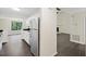 Kitchen features stainless steel appliances and dark hardwood floors at 2317 Tall Sail Dr # 1007 G, Charleston, SC 29414
