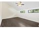 Large bedroom with dark hardwood floors and ceiling fan at 2317 Tall Sail Dr # 1007 G, Charleston, SC 29414
