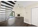 Spacious living room with a fireplace and sliding glass doors at 2317 Tall Sail Dr # 1007 G, Charleston, SC 29414