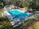 Inviting community pool with lounge chairs and a pool house at 2317 Tall Sail Dr # 1007 G, Charleston, SC 29414