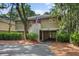 Two-story home with carport and landscaping at 1103 Summerwind Ln, Seabrook Island, SC 29455