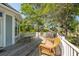 Deck with wicker furniture, table, and grill at 3064 Marshgate Dr, Seabrook Island, SC 29455