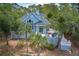 Stunning home with a large deck and lush landscaping at 3064 Marshgate Dr, Seabrook Island, SC 29455