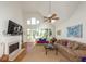 Spacious living room features hardwood floors, a fireplace and vaulted ceilings at 3064 Marshgate Dr, Seabrook Island, SC 29455