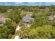 Aerial view of waterfront home in a wooded community at 3064 Marshgate Dr, Seabrook Island, SC 29455