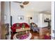 Open living room and kitchen with hardwood floors at 291 Coming St, Charleston, SC 29403