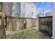 Backyard area with wooden fence and side yard access at 291 Coming St, Charleston, SC 29403