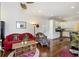 Open living area with hardwood floors and kitchen view at 291 Coming St, Charleston, SC 29403