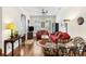 Living room with hardwood floors, red couches, and a cozy atmosphere at 291 Coming St, Charleston, SC 29403