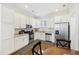 Modern kitchen with white cabinets, stainless steel appliances at 291 Coming St, Charleston, SC 29403