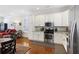 Modern kitchen with white cabinets, stainless steel appliances and granite at 291 Coming St, Charleston, SC 29403