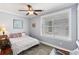 Comfortable bedroom with hardwood floors and ceiling fan at 291 Coming St, Charleston, SC 29403
