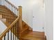 Elegant staircase with dark wood and iron railings at 291 Coming St, Charleston, SC 29403
