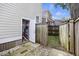 Small backyard with storage shed and wooden fence at 291 Coming St, Charleston, SC 29403