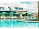 Children playing in a refreshing resort-style pool at 407 Swaying Pine Ln, Summerville, SC 29486