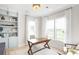 Bright home office features built-in shelves and large windows at 407 Swaying Pine Ln, Summerville, SC 29486