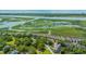 Aerial view of a waterfront townhome community at 242 Little Oak Dr, Folly Beach, SC 29439