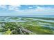 Aerial view showing waterfront property and marsh at 242 Little Oak Dr, Folly Beach, SC 29439