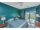 Bedroom with water views, featuring a queen bed and private balcony access at 242 Little Oak Dr, Folly Beach, SC 29439