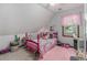 Cozy bedroom with pink accents and a playful atmosphere at 137 Fox Chase Dr, Goose Creek, SC 29445