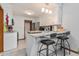 Modern kitchen with white cabinets, granite countertops, and a breakfast bar at 137 Fox Chase Dr, Goose Creek, SC 29445