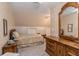 Bright bedroom featuring a wooden dresser and large mirror at 137 Fox Chase Dr, Goose Creek, SC 29445